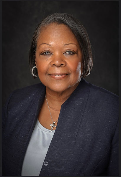 Head shot blue suit 2 2026.jpg