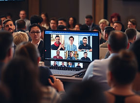 crowd of people looking at a webinar.jpg