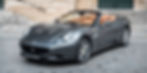 Carequest SÃ rl car broker Switzerland, grey Ferrari California convertible with brown interior three-quarter front view