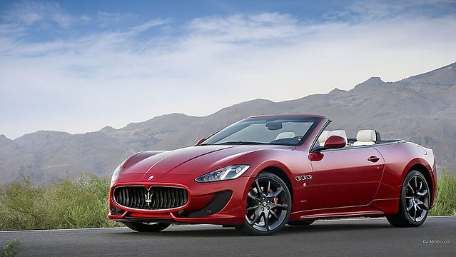 Carequest Sàrl car broker Switzerland, Maserati GranCabrio in red three-quarter front view