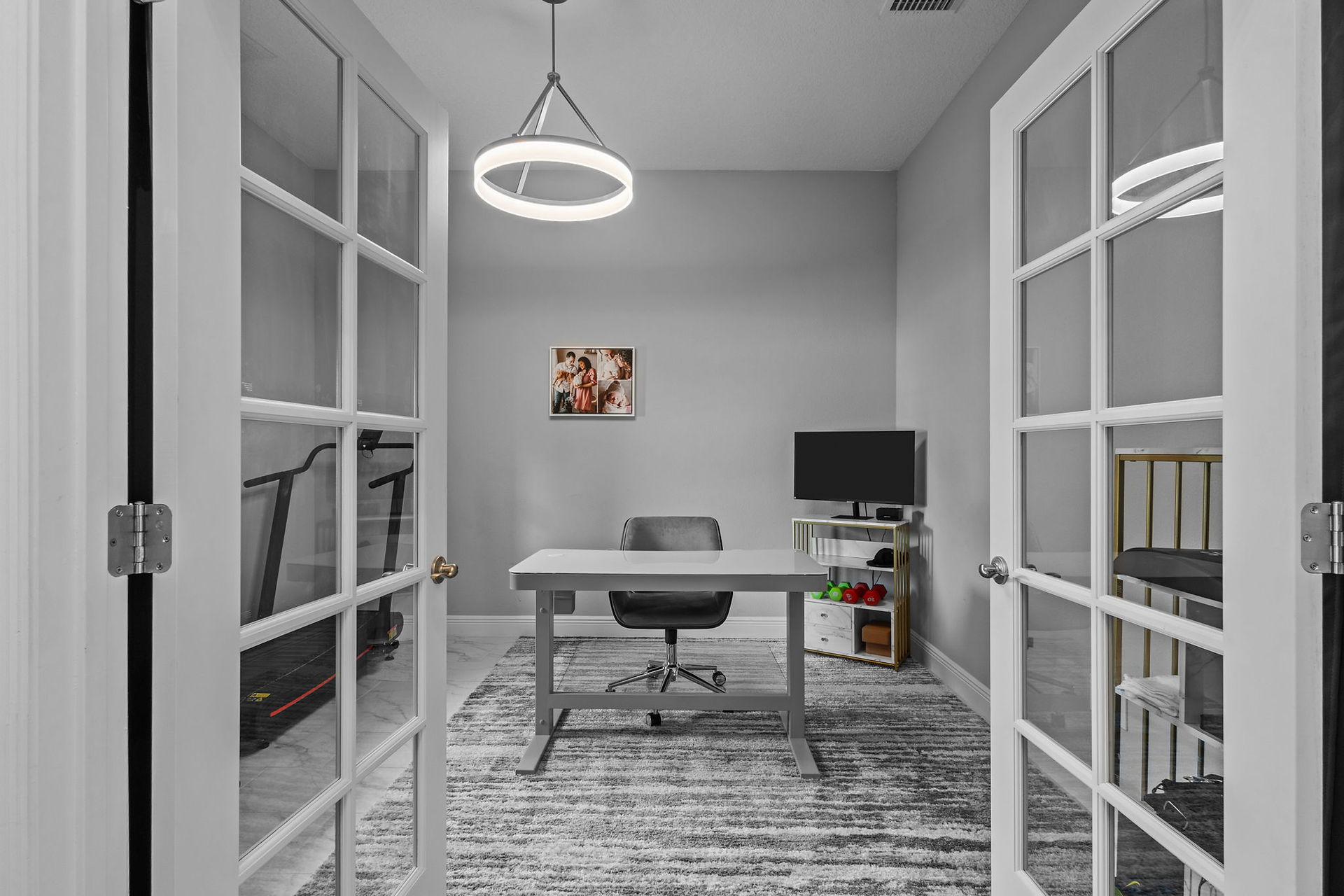 modern office den with office desk and chair