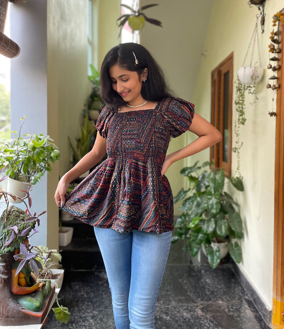 smocked peplum top