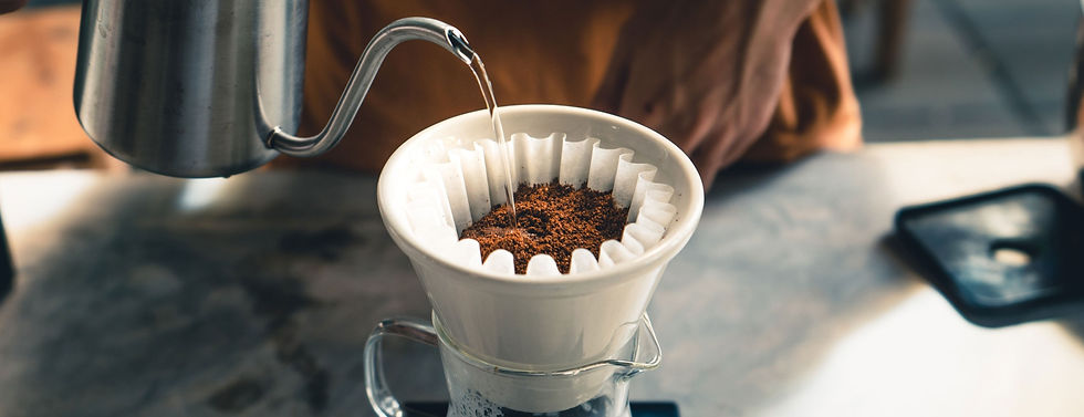 Pouring Coffee into Filter_edited.jpg