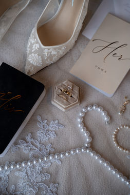 bridal details - lace high heal, wedding rings, pearl hanger