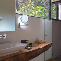 Natural elements abound in our boutique retreat hotel's bathrooms