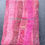 Thumbnail: A nuno felt book cover featuring red wool fibres, red and pink sari silk
