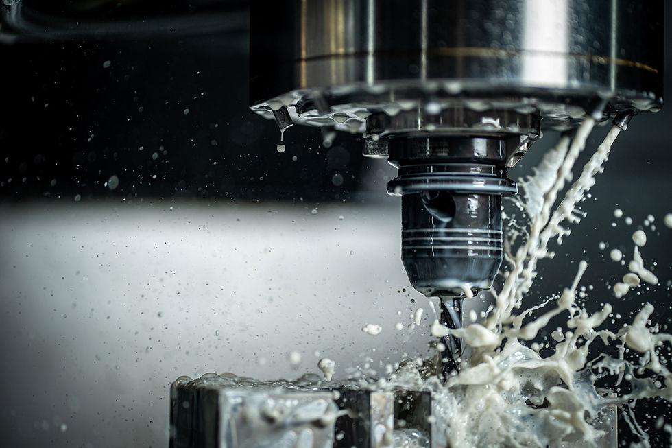 CNC-machine-drilling-holes-with-carbide-drill-and-coolant-being-used_edited.jpg