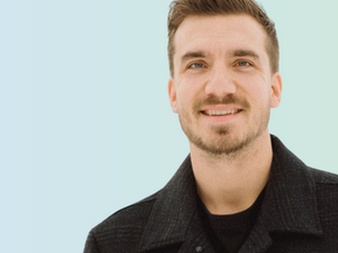 A headshot of CEO, Carson