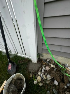 Loose fence post secured and repaired by TK Painting & Contracting