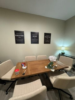 Artwork and shelving installation in finished interior space