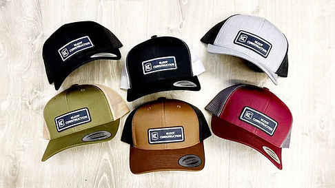 Custom embroidered hats with company logos for branding and promotional use