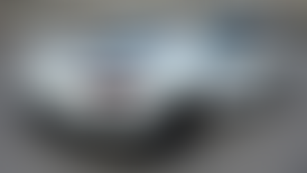 Custom vehicle wrap on a sports car highlighting bold colour and design flexibility