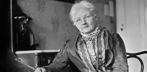 black and white picture of woman in a dress