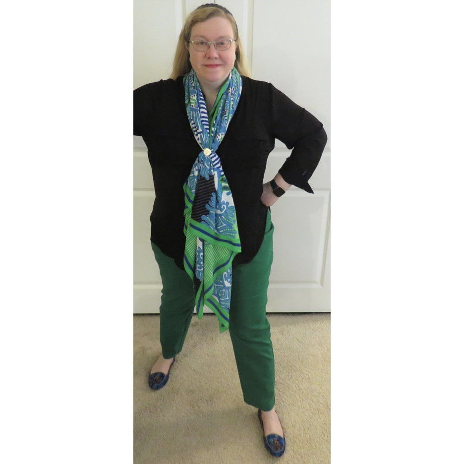 Plus size Christmas season outfit idea for women over 40 with bright green
