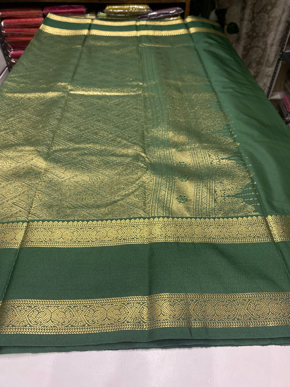 Thumbnail: Thilagam - Dark orange green