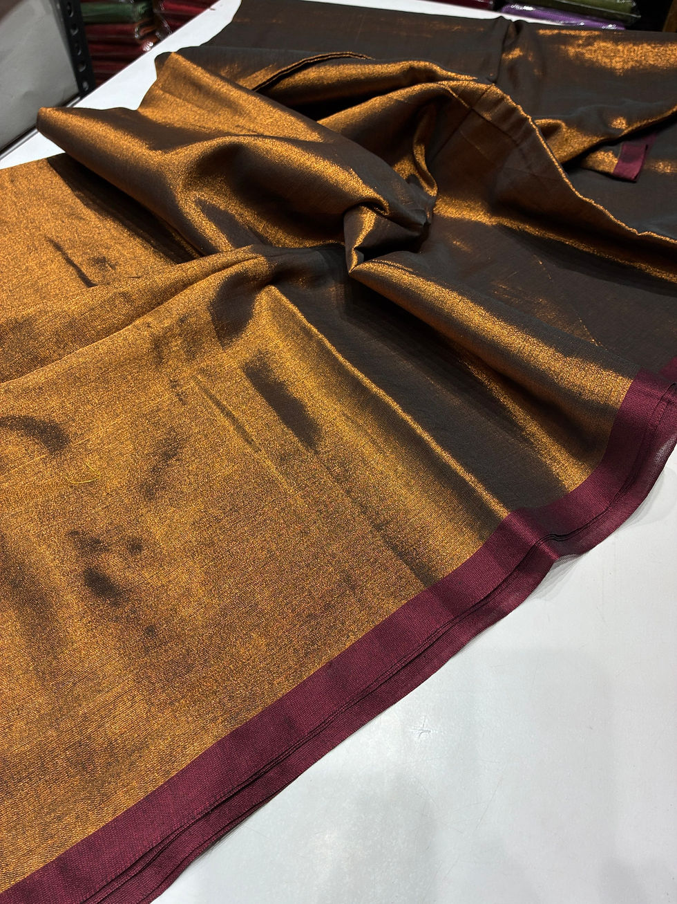 Thumbnail: Maroon copper mul tissue 