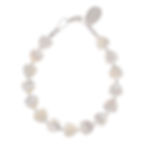 White flat lay of Carrie Elspeth Shell Hearts Mother Of Pearl Beaded Bracelet which is handmade Welsh jewellery