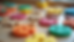Close-up view of a textured sensory board with various tactile materials