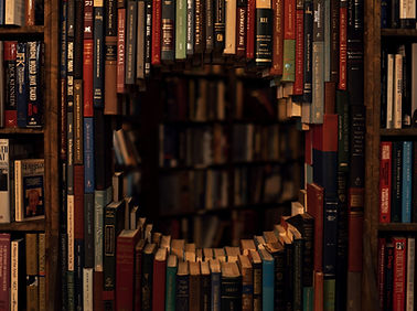 library books with a hole punched through