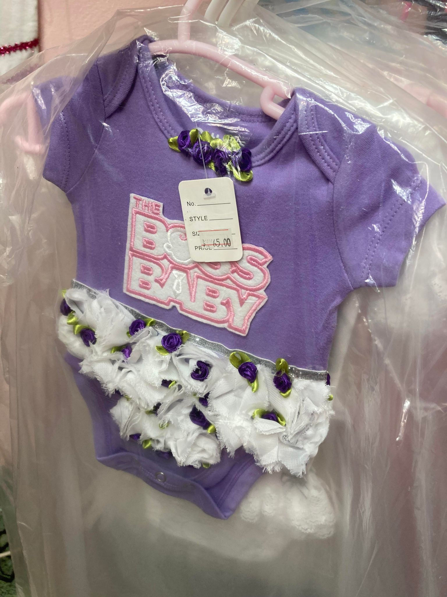 Purple BOSS BABY floral skirted Onesie