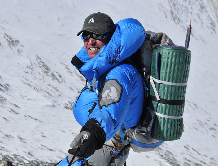 Ed Viesters climbing Mount Everest wearing a First Ascent Down Suit we designed