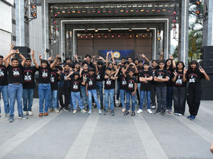 Students of Hum & Strum Music School Posing for a Group Photo Before the Show