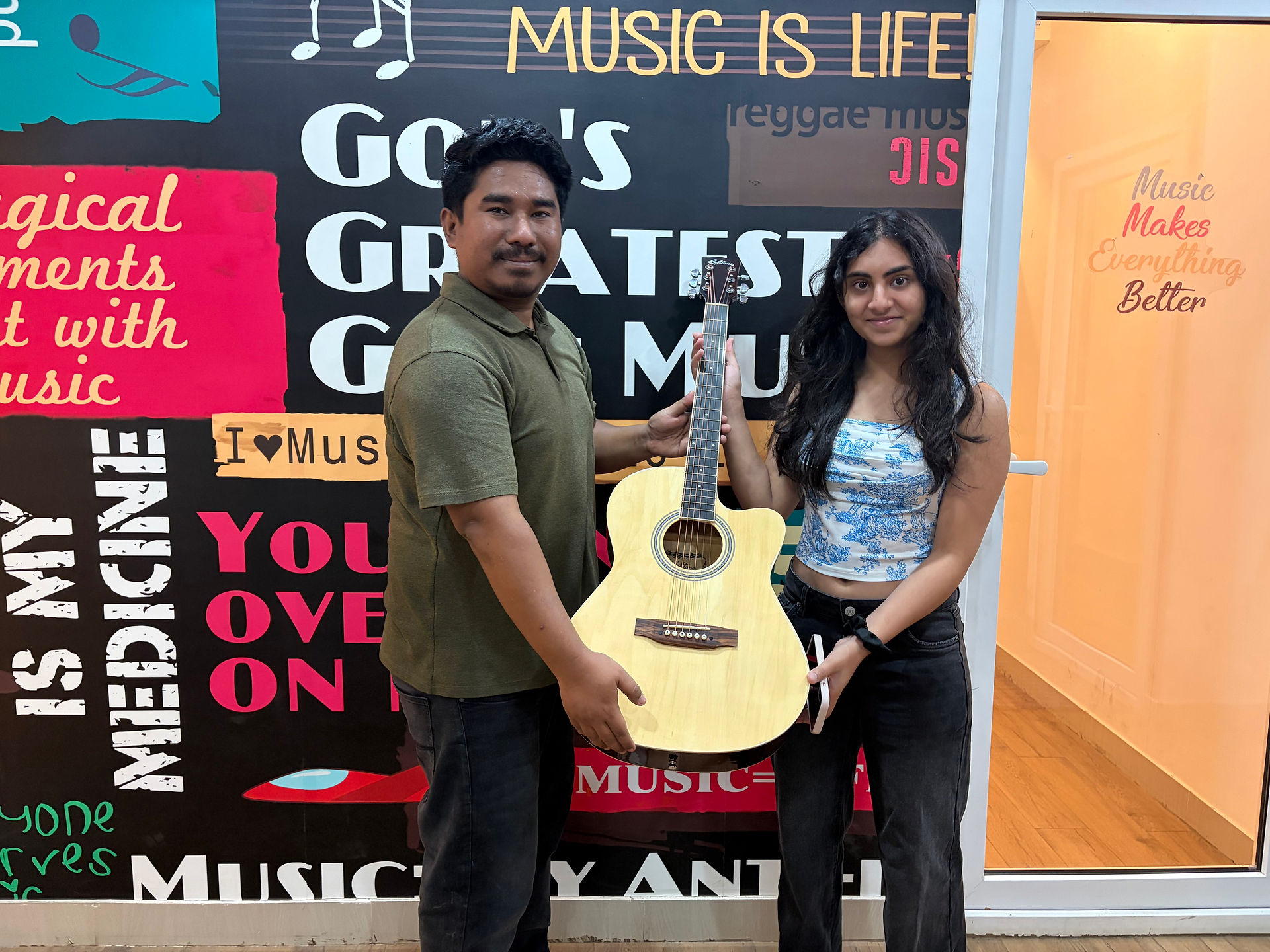 Winners receiving their prizes at Hum & Strum Rising Stars 2026.