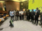 Diverse group of professionals at a conference event.