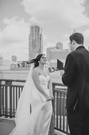 A bride listening to her groom's vows on her Charlotte wedding day