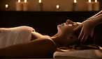 Young woman enjoys massage in a luxury spa resort.jpg