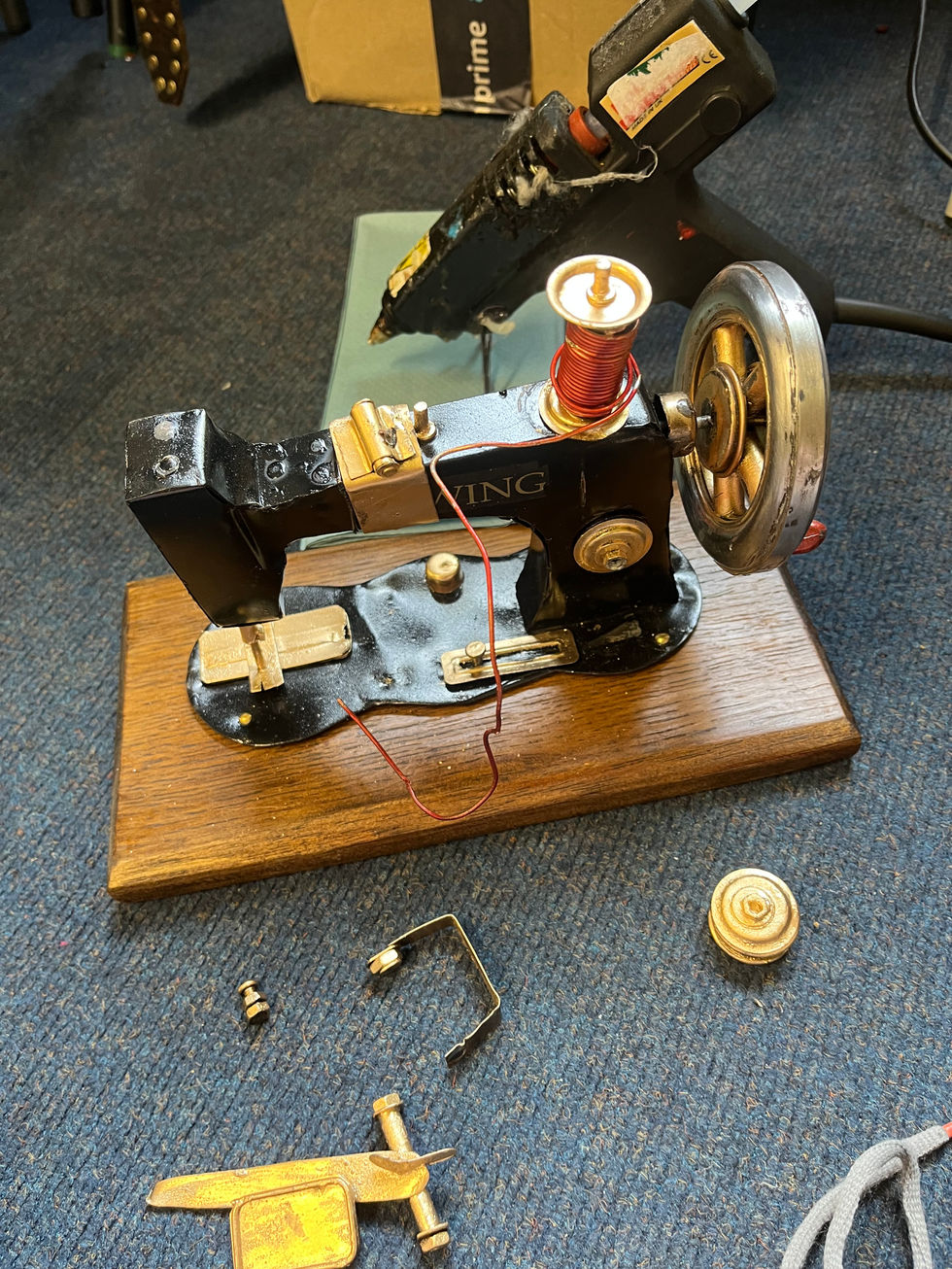 Repairing a broken sewing machine prop