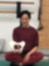 Anna Restore Your Core Holding a Pelvis model