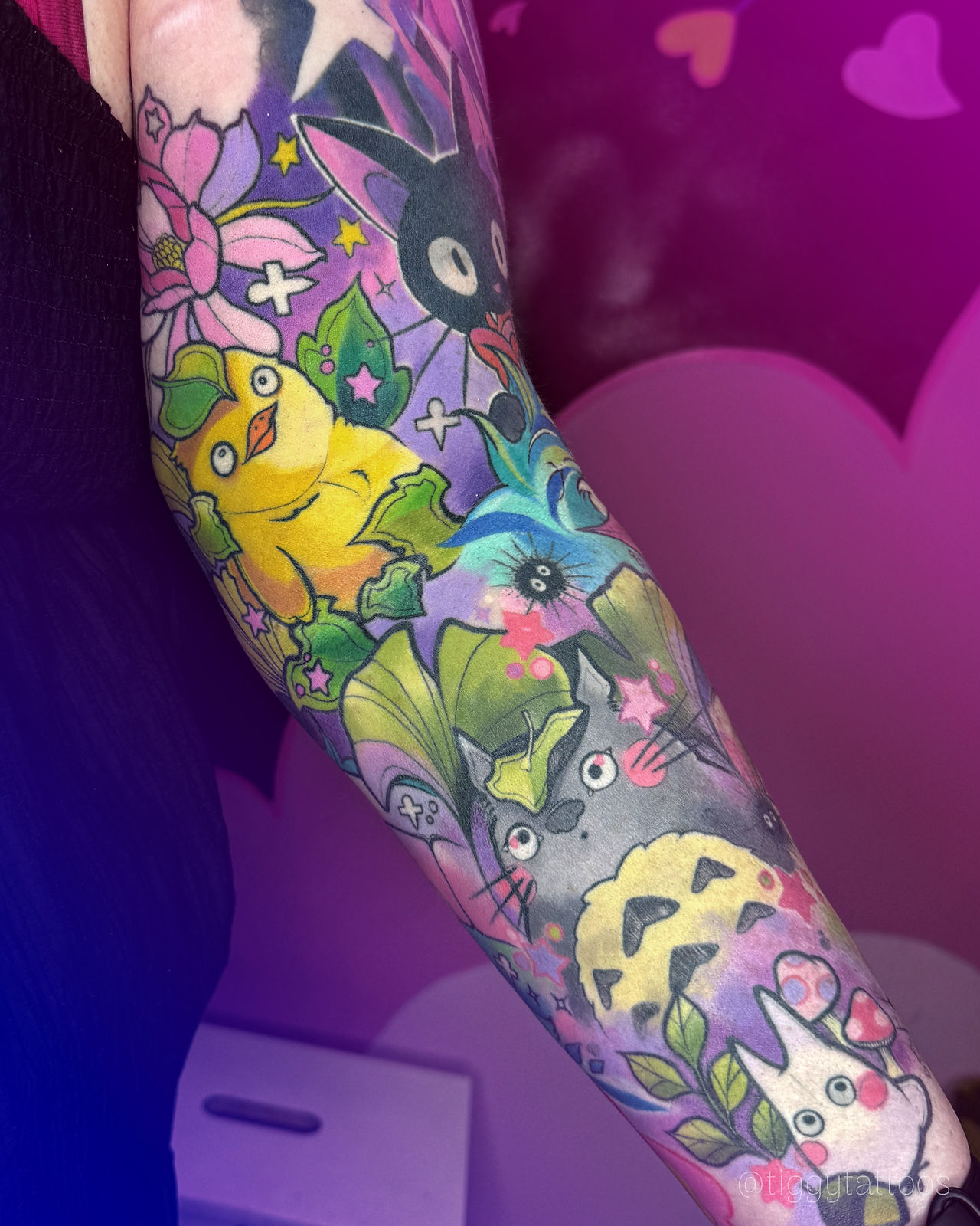 studio ghibli tattoo sleeve, spirited away, totoro, jiji kikis delivery service, bathhouse ducks, colourful studio ghibli anime tattoo by tiggy tattoos from gloucester uk