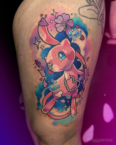 Mew gen 1 legendary mythic pokemon tattoo with bubbles in colour by tiggy tattoos from gloucester uk