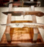 Knife display with Marbles knife, White River Knives, and Rapid River Knives