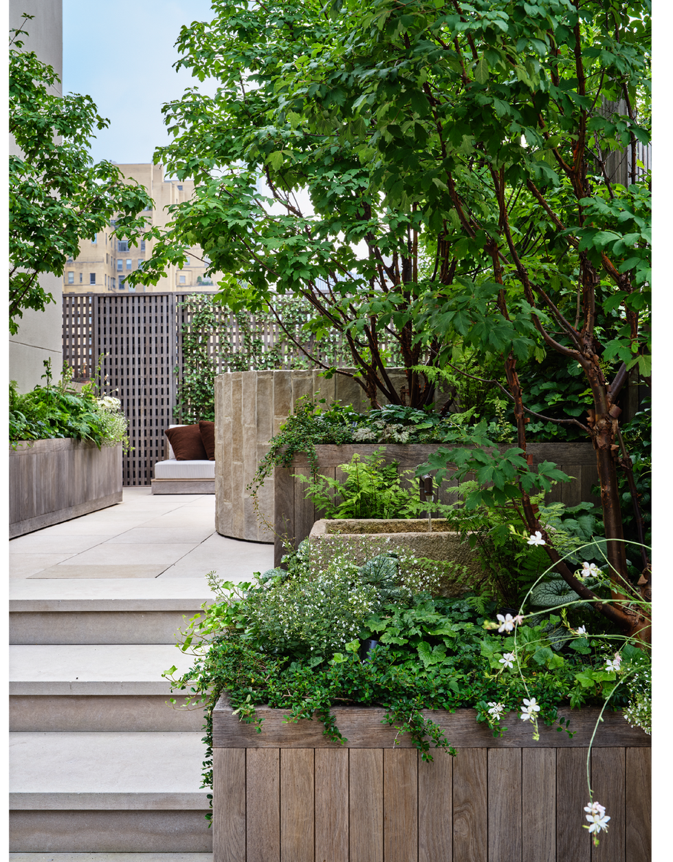 Wood clad planters lining steps.
