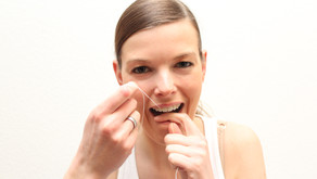 How to Properly Floss Teeth