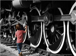 Small Boy Big Wheels by Grace Glaister