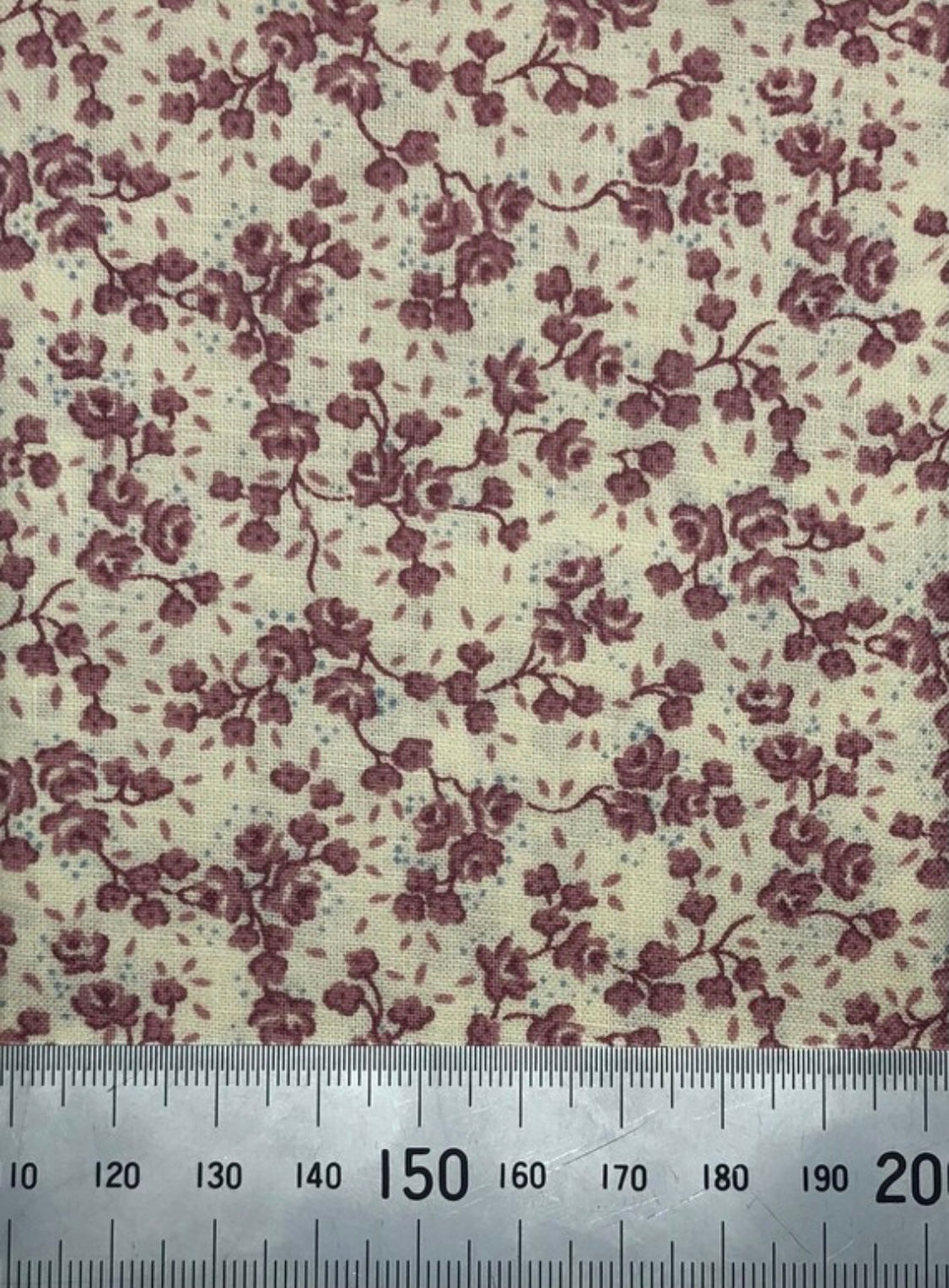 Red floral print with blue dots