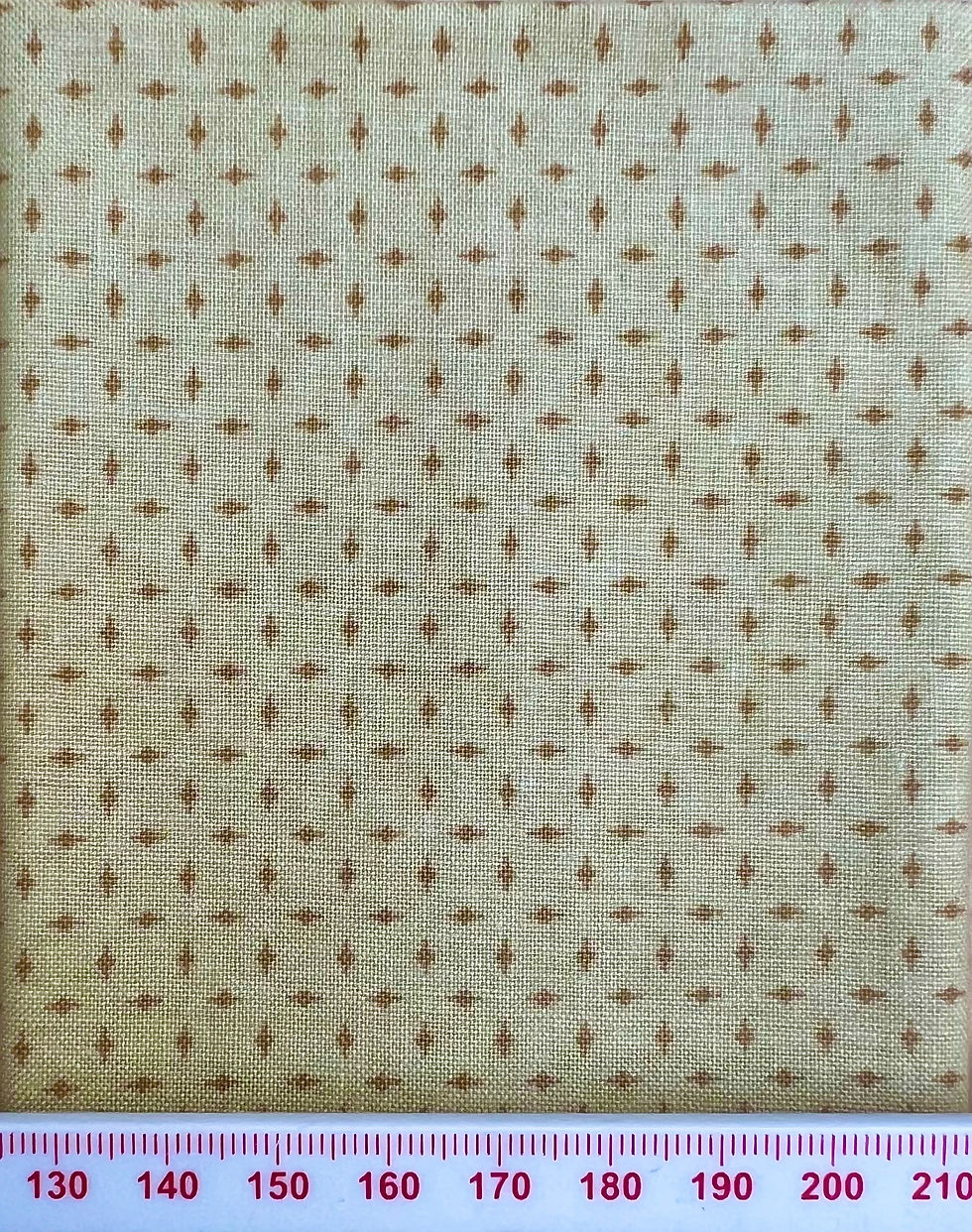 Beige pattern on cream cotton