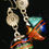 Thumbnail: Fused Glass Earrings - Dichroic with Orange Stripes under clear