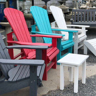 display of rising Adirondack chairs, tables, benches, and foot rests