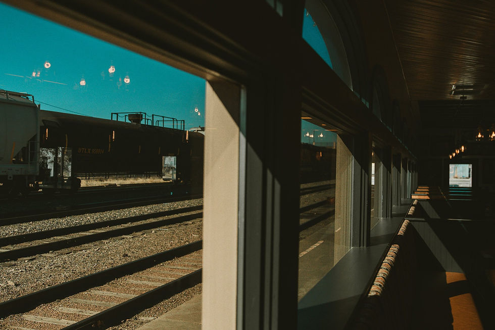 Historic Colorado Springs train depot window overlooking the railroad tracks