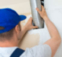 Technician replacing vent in home