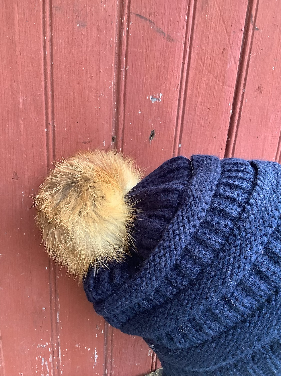Navy blue knit hat with Red Fox pompom