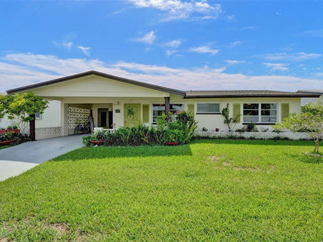Waterfront 2BR gem in a 55+ Tamarac community—updated, turnkey, and priced at just $349,900!