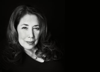 Black and white photo of woman smiling (portrait by Robin Buonomo of October Two