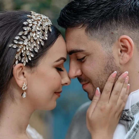 Newly married couple posing for photo