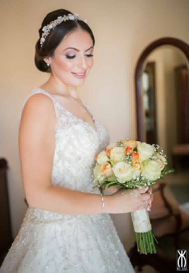 Beautiful bride holding a bouquet