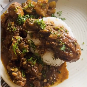 Jamaican jerk chicken & potato curry w/rice.